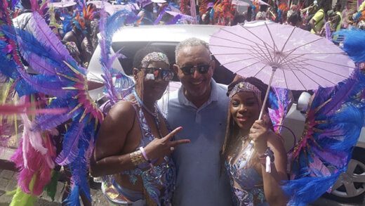 Opposition Leader Godwin Friday among masqueraders during Mardi Gras on July 11, 2023. 
