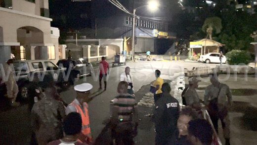 Police and onlookers at the scene of the shooting in Kingstown on Wednesday, July 19, 2022.