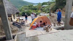 Canouan residents are protesting the erection of a metal gate at the entrance of a resort to the north of the island. (Image: Screenshot from Canouan Islanders' video)
