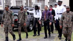 Murderers Kendine "Hoodie" Douglas, left, Richard "Carib" Francis and Schemel "Jacket" Dunbar return to prison on Wednesday, Aug. 2, 2023.