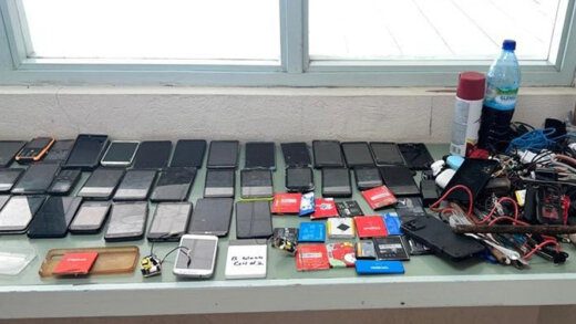 Cell phones and other items seized during a search of Belle Isle Correctional Facility on April 21, 2023.