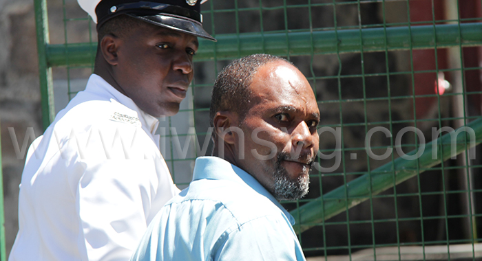 Glenroy Glasgow is escorted to prison to await sentencing after pleading guilty to rape on Tuesday, Sept. 19, 2023. 