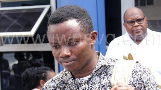 The accused priest, Kizito Igwebudul leaves the Kingstown Magistrate's Court in the company of the Bishop of the Diocese of Kingstown, Gerard County, in the background, on Oct. 23, 2023. He was freed of the charges on Thursday, March 7, 2024