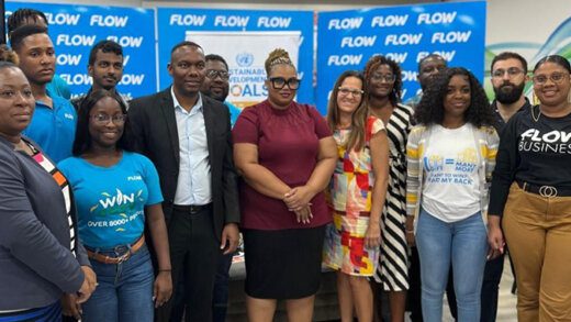 Country Manager, Flow St Vincent, Wayne Hull, fourth from left, with Country Coordinators Lafleur Quammie, centre, of the United Nations Development Coordination Office and Nicole Trudeau of UNICEF. They are surrounded by stakeholders representing UNESCO, UNWOMEN, UNDP, WFP, and UNFPA following the launch of the ‘Act Now’ campaign.
 
