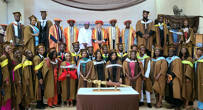 Prime Minister of St. Vincent and the Grenadines, Ralph Gonsalves, centre rear, pose with former president of the Nigeria, Olusegun Obasanjo pose with faculty and students of Bells University of Technology of Nigeria on Friday, Nov. 3, 2023. (Photo: API)