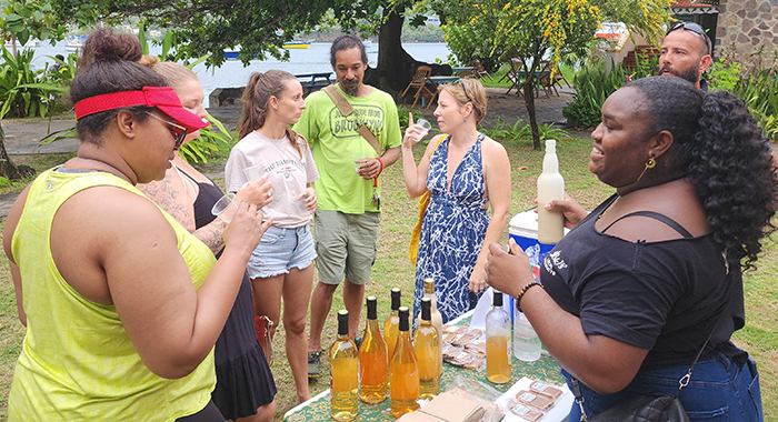 Customers sampling local wine from BJs