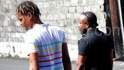 The defendant, Jaylon Butler, left, and his father, Ken-I Young leave the Kingstown Magistrate's Court after the sentencing on Wednesday, Nov. 8, 2023.