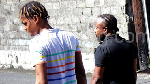 The defendant, Jaylon Butler, left, and his father, Ken-I Young leave the Kingstown Magistrate's Court after the sentencing on Wednesday, Nov. 8, 2023.