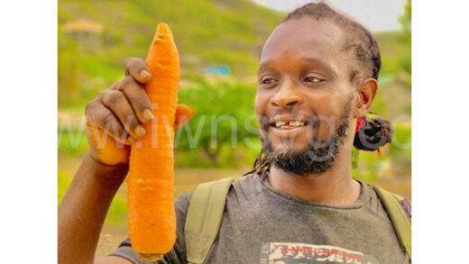 Farmer Jimodean “Jim” Sam was gunned down in Layou on Thursday, Nov. 23, 2023 while walking along a mountain road. He is seen here in an undated social media photo showing off one of his carrots.