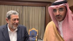 Prime Minister of St. Vincent and the Grenadines, Ralph Gonsalves, left and CEO of the Saudi Fund for Development, Sultan bin Abdulrahman Al-Marshad.