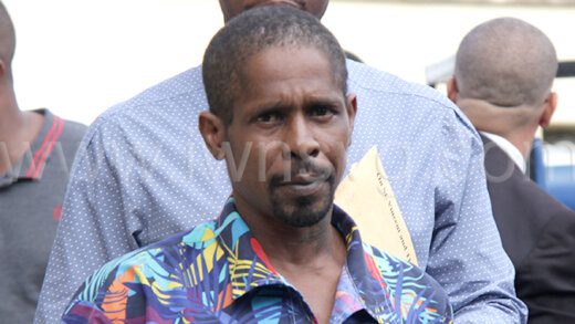 Ronald "John Small" Isaacs outside the Serious Offences Court on Nov. 13, 2023.