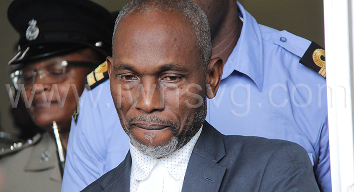 Defence Counsel Jomo Thomas leaves the High Court on Dec. 21, 2023.