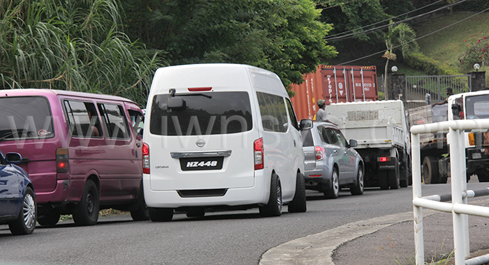 A minibus attempts to overtake in bumper-to-bumper traffic in Lowmans Hill on Nov. 23, 2023.