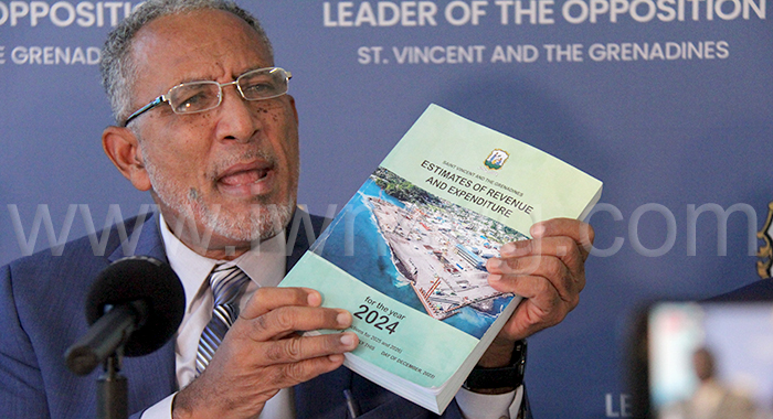 Opposition Leader Godwin Friday holds up a copy of the 2024 Estimates at a press conference in Kingstown on Wednesday, Jan. 10, 2024. He said the 2024 Budget was "a budget full of mistakes".