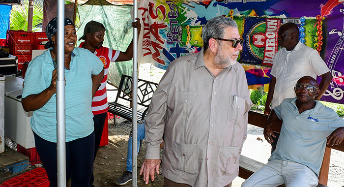 Prime Minister Ralph Gonsalves, centre, interacts with people on the "village" side of Buccament Bay on Tuesday, Jan. 30, 2024.  (Photo: Lance Neverson/Facebook)