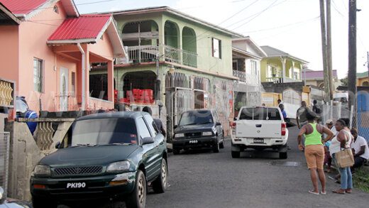 Police and onlookers at the scene of the robbery in Campden Park on Saturday, Jan. 20, 2023.