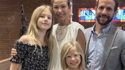 Christian Klepser, right, and his daughter Annik, left, and Madita, third from left, died in the crash. They are photographed here with Jessica, Klepser's wife and the children's mother. 