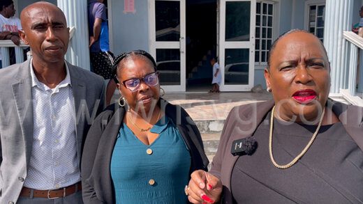 From left: The defendants, Carly John, Sherry Ann Caine and their lawyer, Kay Bacchus-Baptiste.