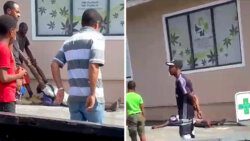Two screenshots of the injured man outside the pharmacy in Arnos Vale on Saturday, Feb. 17, 2024.