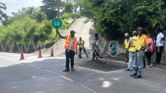 A work crew repairs a section of the Mandela Highway in Gibson Corner on Feb. 2, 2024.