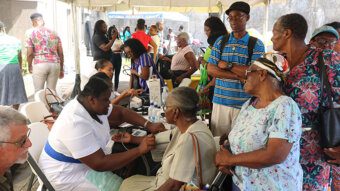 Pensioners receiving healthcare at NIS Pensioners Appreciation Day 2023.