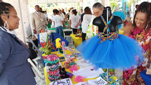 Diani Prince, wife of Prime Minister of St. Kitts and Nevis Terrance Drew, right, and Eloise Gonsalves, wife of Prime Minister of St. Vincent and the Grenadines, at the at CELAC mini expo. 