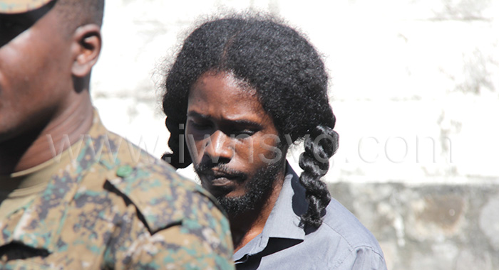 The defendant, Courtney Phillips arrives at the Kingstown Magistrate's Court on Thursday March 21, 2024.