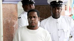 Police escort the defendant, Delanio Baptiste to prison on Tuesday, March 26, 2024, to complete his sentence.