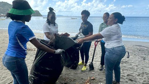 St. Vincent Brewery Ltd. staffers collecting garbage in Roucher Bay as part of the company’s beach clean-up to commemorate World Water Day activities.