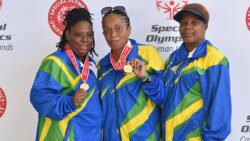 From left: Athletes Utica Smith and Natasha Doyle and coach Helen Ashton.
