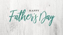 Happy Father's Day Green Calligraphy Script Over White Wood Texture Background