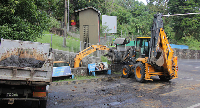 Heavy equipment clean a gutter in Sion Hill on Sunday, June 30, 204 ahead of Monday's anticipated impact of Hurricane Beryl, a category 4 cyclone.