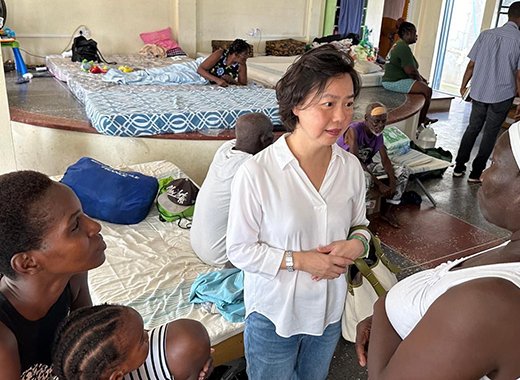 Taiwan Ambassador to SVG, Fiona Huei-Chun Fan interacts with people at an emergency shelter in Canouan on Tuesday, July 9, 2024, who were displaced by Hurricane Beryl, which impacted the island on July 1, 2024. 