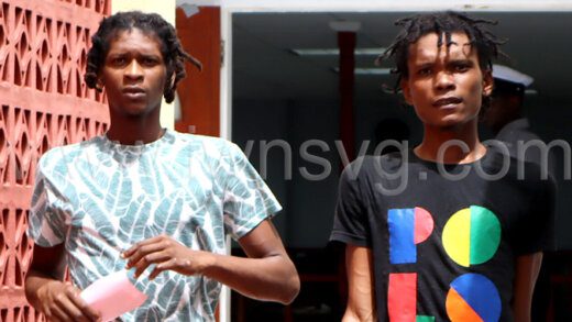 Jace Baptiste, right, and Yannick Matthias leave the Colonarie Magistrate's Court sitting at Georgetown on Aug. 15, 2024. 