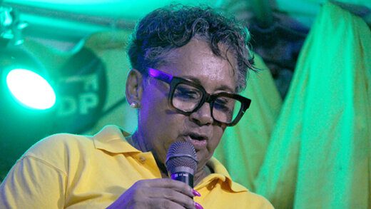 New Democratic Party's East St. George candidate, Laverne Gibson-Velox speaking at a village meeting in Enhams on Wednesday, Aug. 28, 2024.
