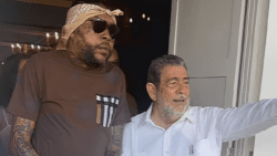 Jamaican dance hall artiste, Vybz Kartel, left, and Prime Minister of St. Vincent and the Grenadines at the Official Residence of the Prime Minister, in Kingstown in August 2024.  (Screenshot from Stv Online video)