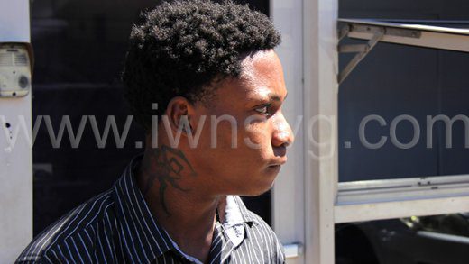 Ajauné Grant outside Kingstown Magistrate's Court on March 2, 2023, after he had attacked his stepfather. 