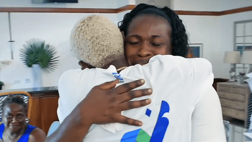Jessica Maloney and her daughter, Olympian Shafiqua Maloney, embrace for the first time in eight years at Argyle International Airport on Wednesday, Sept. 18, 2024. (Screenshot from Discover St. Vincent and The Grenadines video)