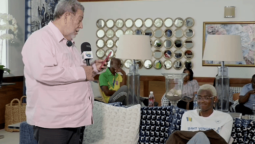 Prime Minister Ralph Gonsalves, left, and Vincentian Olympian Shafiqua Maloney at the welcome ceremony at Argyle International Airport on Wednesday, Sept. 18, 2024. 