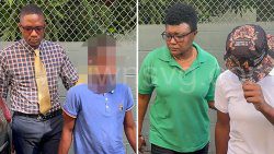 Detectives escort the two juvenile murder accused to court on Oct. 4, 2024.