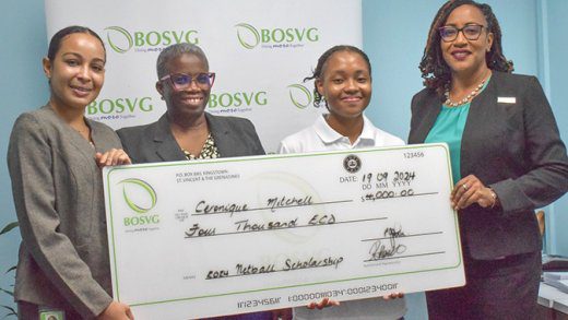 From left: Regissha Hazell of BOSVG, President of the SVG Netball Association, Natasha Baptiste, scholarship awardee, Ceronique Mitchell, and Marketing and Communications Manager at BOSVG, Patricia John.