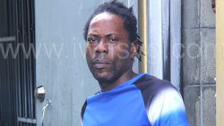 St. Lucian Ezra Henry is escorted from the Serious Offences Court in Kingstown on Thursday, Oct. 24, 2024.