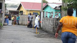 Police and onlookers at the scene of the fire in Georgetown on Wednesday, Oct. 23, 2024. 
