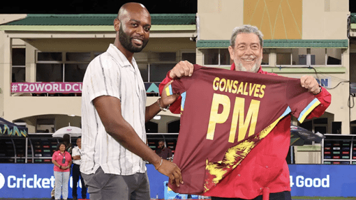 Kishore Shallow, president of Cricket West Indies, presents a West Indies-themed shirt to Ralph Gonsalves, prime minister of St. Vincent and the Grenadines, during an ICC Men's T20 Cricket World Cup 2024 match between Afghanistan and Bangladesh at Arnos Vale Sporting Complex on June 24, 2024. (Photo by Darrian Traynor-ICC/ICC via Getty Images)