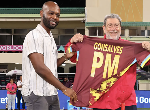 Kishore Shallow, president of Cricket West Indies, presents a West Indies-themed shirt to Ralph Gonsalves, prime minister of St. Vincent and the Grenadines, during an ICC Men's T20 Cricket World Cup 2024 match between Afghanistan and Bangladesh at Arnos Vale Sporting Complex on June 24, 2024. (Photo by Darrian Traynor-ICC/ICC via Getty Images)