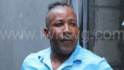 Murder accused, Nolwyn Bennette aka Nolly B leaves the Serious Offences Court on Wednesday, Oct. 3, 2024.