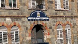 The woman said she was ordered to sit on a bench at the Central Police Station in Kingstown after the van was taken there.