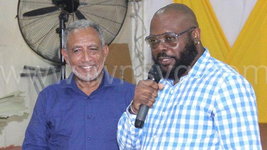 Opposition Leader and NDP President, Godwin Friday, left, and Kaschaka Cupid on Thursday, Dec. 19, 2024, after the NDP's West St. George council elected him as their preferred candidate in the next general election.