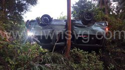 The minivan after it plunged over an embankment at Boat Bay, resulting in the death of the conductor on Friday, Dec. 13, 2024.