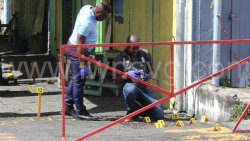 Crime scene technicians from the Royal St. Vincent and the Grenadines Police Forces process the scene of the shooting in Rose Place on Tuesday, Dec. 10, 2024.